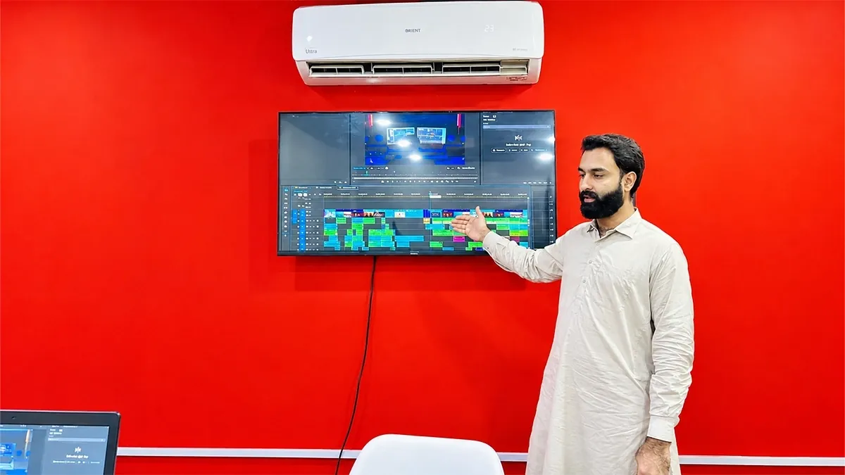 Video editing course in Rawalpindi — Mr. Hasnain explaining a Premiere Pro timeline during a class at SkillsVerse, Satellite Town